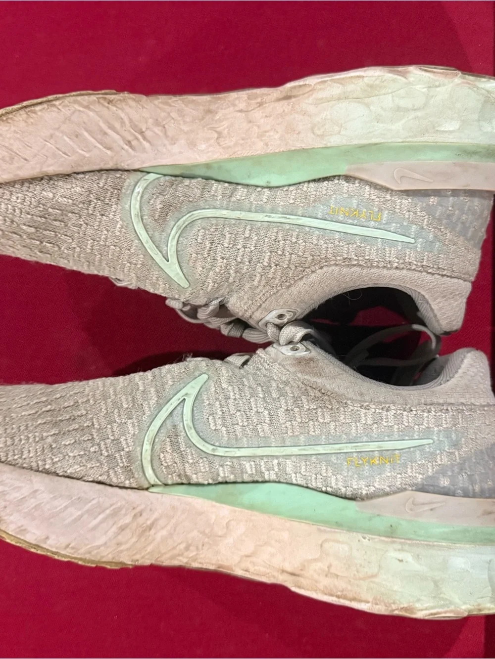 Nike Women’s Light Gray Knit Sneakers with Mint Accents